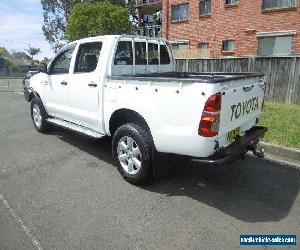 2011 Toyota Hilux KUN26R MY12 SR (4x4) White Manual 5sp M Dual Cab Pick-up