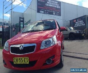 2010 Holden Barina TK MY11 GA Red Manual 5sp M Hatchback