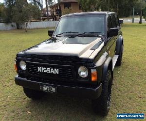 1991 Nissan Patrol TI (4x4) Black Manual 5sp M Wagon