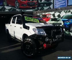 2006 Toyota Hilux KUN26R SR5 (4x4) White Manual 5sp M Dual Cab Chassis for Sale