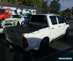 2006 Toyota Hilux KUN26R SR5 (4x4) White Manual 5sp M Dual Cab Chassis