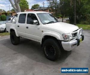 2004 Toyota Hilux KZN165R SR5 (4x4) White Manual 5sp M Dual Cab Pick-up