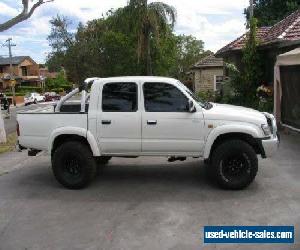 2004 Toyota Hilux KZN165R SR5 (4x4) White Manual 5sp M Dual Cab Pick-up