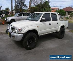 2004 Toyota Hilux KZN165R SR5 (4x4) White Manual 5sp M Dual Cab Pick-up