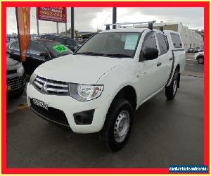 2009 Mitsubishi Triton MN MY10 GLX White Automatic 4sp A 4D Utility