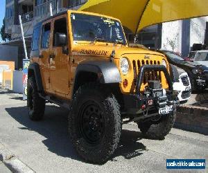 2012 Jeep Wrangler Unlimited JK MY13 Sport (4x4) Orange Automatic 5sp A Softtop