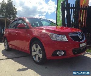 2014 Holden Cruze JH MY14 Equipe Red Manual 5sp M Sedan