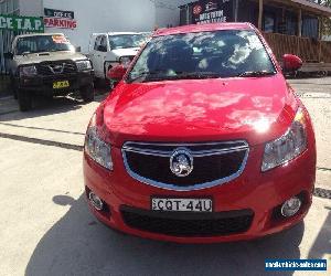 2014 Holden Cruze JH MY14 Equipe Red Manual 5sp M Sedan