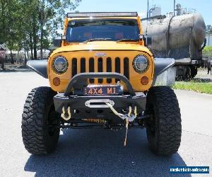 2012 Jeep Wrangler JK MY2012 Unlimited Sport Orange Manual 6sp M Softtop