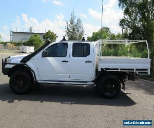 2010 Nissan Navara D40 RX White Manual 6sp M 4D UTILITY