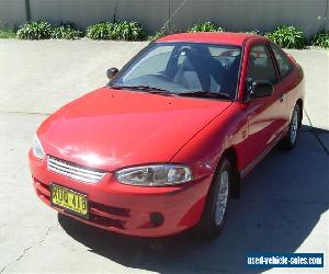 MITSUBISHI LANCER 02/02 2 DOOR COUPE 5 SPD MAN STER AND AIR WITH 151600KL CHEAP 