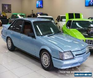 1985 Holden Commodore VK SL Asteroid Silver Automatic 3sp A Sedan