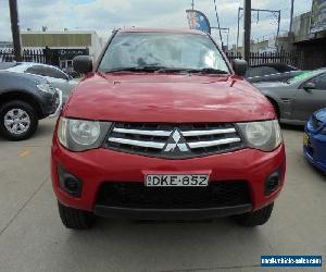 2010 Mitsubishi Triton MN MY11 GLX Red Automatic 4sp A 4D Utility