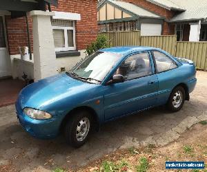 Mitsubishi Lancer CC coupe 1994  - 5 speed manual, A/C works - CHEAP TRANSPORT