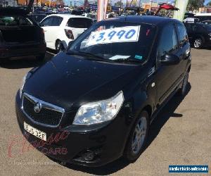 2009 Holden Barina TK MY09 Black Manual 5sp M Hatchback