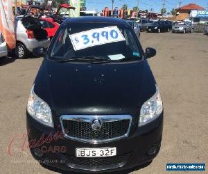 2009 Holden Barina TK MY09 Black Manual 5sp M Hatchback