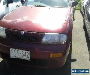 nissan auto, runs and dives fine , unrego paint fadded