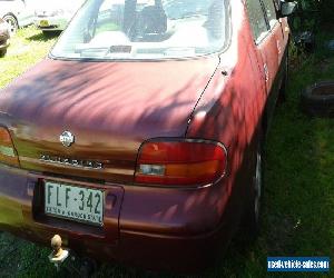 nissan auto, runs and dives fine , unrego paint fadded