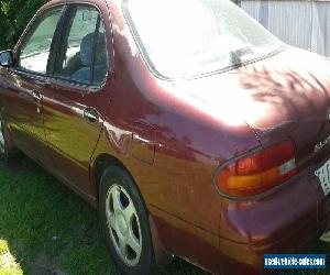 nissan auto, runs and dives fine , unrego paint fadded