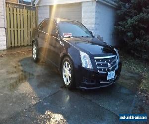 Cadillac: CTS Bose 6 disc audio, panoramic sun roof, dual climate