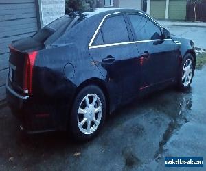 Cadillac: CTS Bose 6 disc audio, panoramic sun roof, dual climate