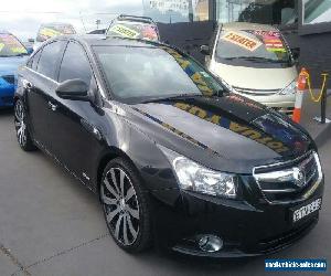 2010 Holden Cruze JG CDX Black Automatic 6sp A Sedan