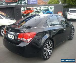 2010 Holden Cruze JG CDX Black Automatic 6sp A Sedan