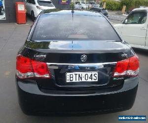 2010 Holden Cruze JG CDX Black Automatic 6sp A Sedan