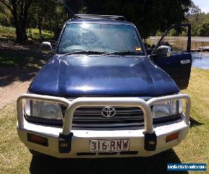 2 X V8 PETROL GXL LANDCRUISERS BLUE AND WHITE 