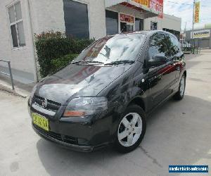 2005 Holden Barina TK Black Automatic 4sp A Hatchback