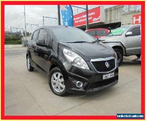 2010 Holden Barina Spark MJ MY11 CD Black Manual 5sp M Hatchback