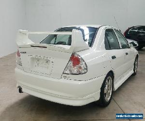 2003 Mitsubishi Lancer with EVO VI body kit