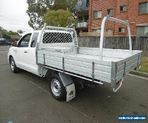 2013 Toyota Hilux GGN15R MY12 SR White Automatic 5sp A Extracab