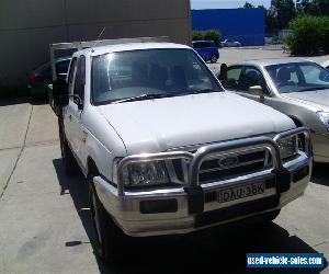 FORD COURIER TWIN CAB 05/2004 TURBO DIESEL 4WD STEER AND AIR TABLETOP WITH SIDES