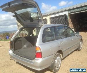 mitsubishi lancer wagon 2000 auto. with reg and rwc