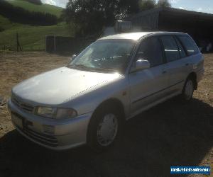 mitsubishi lancer wagon 2000 auto. with reg and rwc