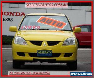 2005 Mitsubishi Lancer CH LS Yellow Automatic 4sp A Sedan