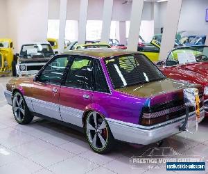 1986 Holden Calais VL Purple Automatic 4sp A Sedan