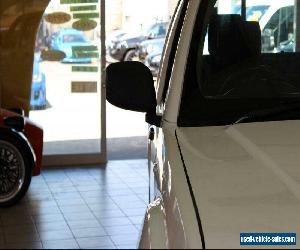 2011 Nissan Navara ST White Automatic A Utility