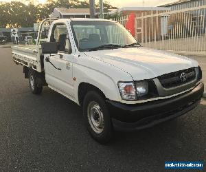 toyota hilux work mate ute 2005 140,000 klms petrol manual  goldcoast 0428933306