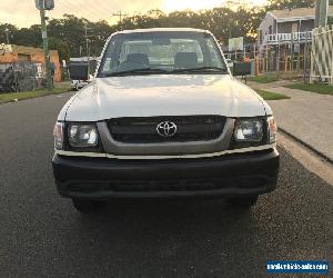 toyota hilux work mate ute 2005 140,000 klms petrol manual  goldcoast 0428933306