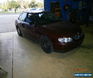 holden vt commodore sedan drives , 