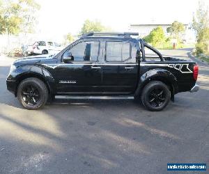 2009 Nissan Navara D40 Titanium Black Automatic 5sp A 4D UTILITY