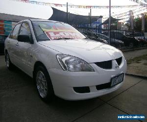 2005 Mitsubishi Lancer CH ES White Automatic 4sp A Sedan