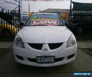 2005 Mitsubishi Lancer CH ES White Automatic 4sp A Sedan