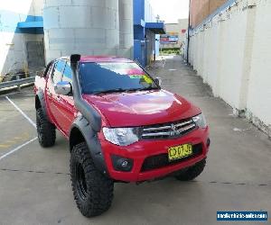 2010 Mitsubishi Triton MN MY11 GLX-R Red Manual 5sp M 4D UTILITY