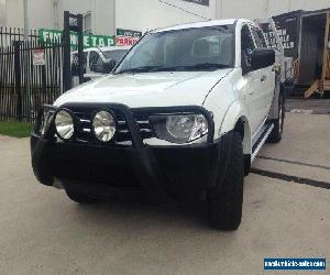 2010 Mitsubishi Triton MN MY10 GLX White Automatic 4sp A Dual Cab Utility