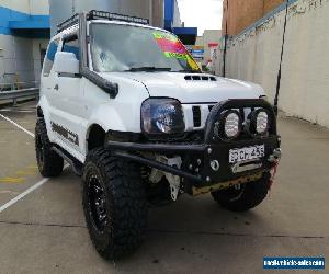 2013 Suzuki Jimny SN413 T6 Sierra White Manual 5sp M 3D HARDTOP