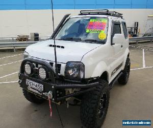 2013 Suzuki Jimny SN413 T6 Sierra White Manual 5sp M 3D HARDTOP