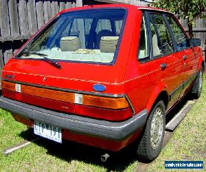 1982 FORD LASER KA GHIA 1.5L AUTOMATIC RED 5 DOOR HATCH AIR-CONDITIONING UNREG